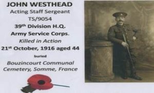 Memorial panel featuring a sepia portrait of a uniformed soldier standing with a cane, alongside printed text reading: “John Westhead, Acting Staff Sergeant, TS/9054, 39th Division H.Q., Army Service Corps. Killed in Action, 21st October 1916 aged 44, buried Bouzincourt Communal Cemetery, Somme, France.” A red poppy illustration appears at the bottom.